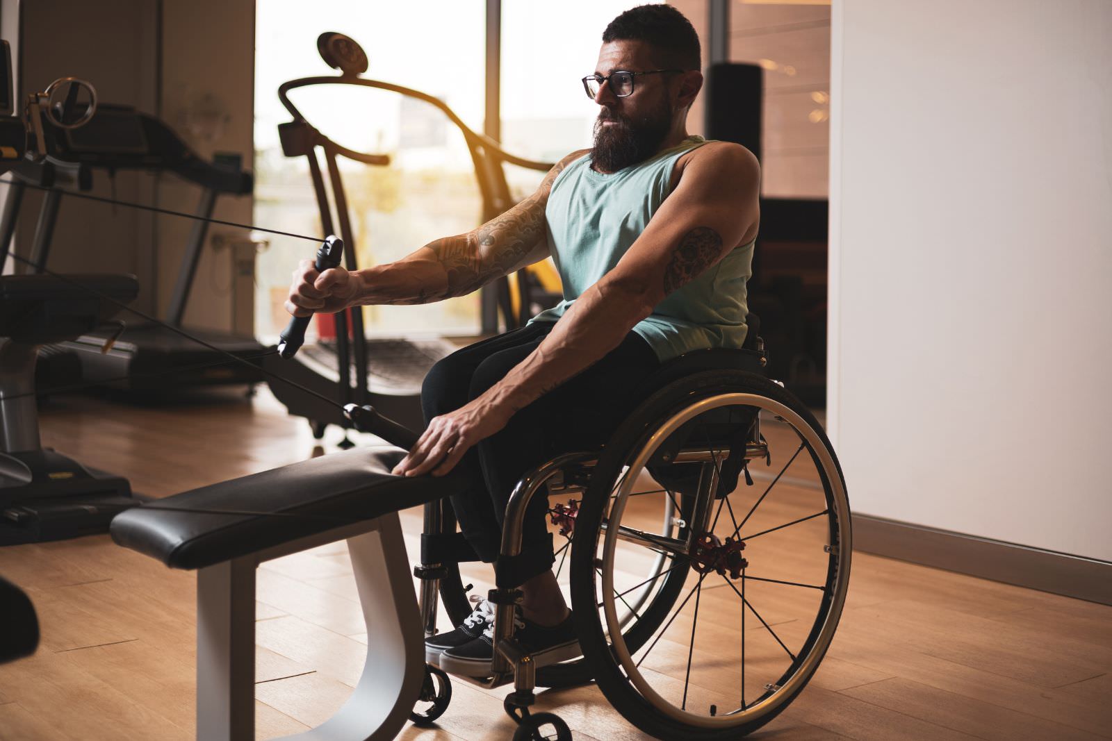 a man in a wheelchair working out
