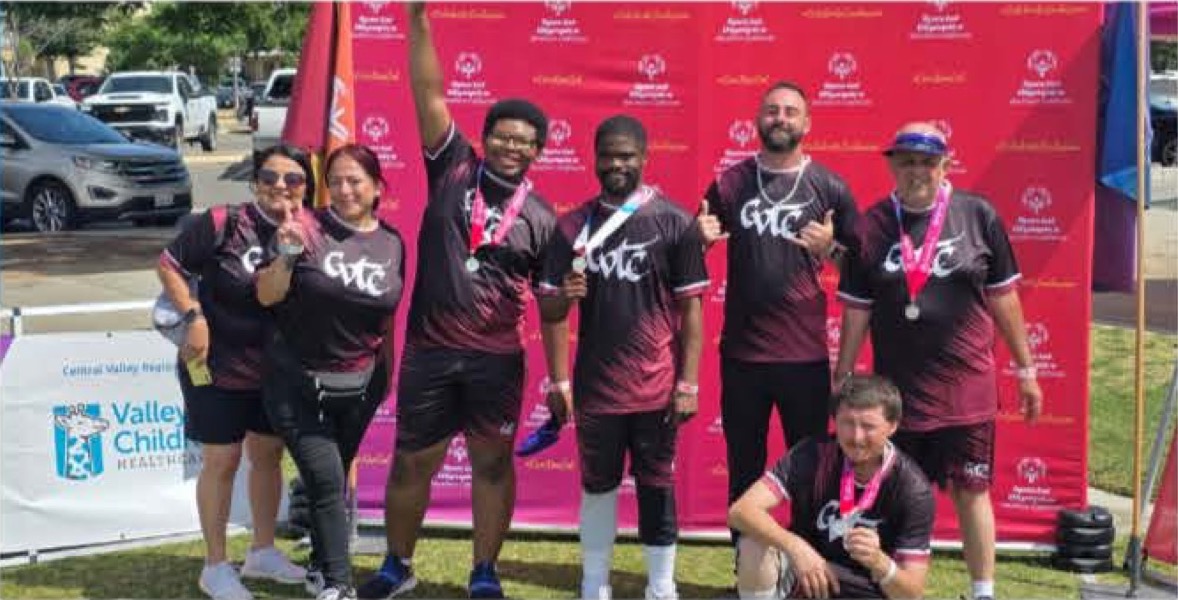 Fresno West's Team CVTC Avengers posing with coaches after earning the silver medal at the Special Olympics Bocce Ball competition.