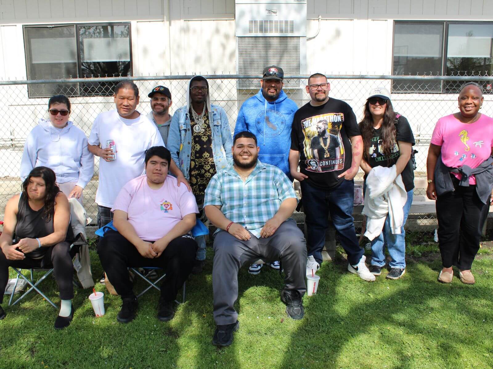 CV Training Center consumers and staff gathered together during an outdoor community life skills program in Stockton, CA