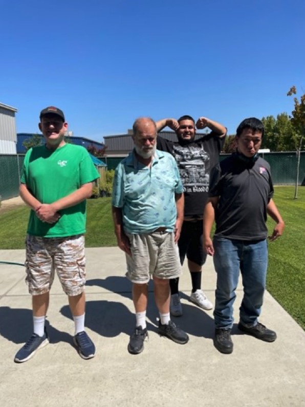 Doug, Brian, George, and Joseph posing for the picture. 