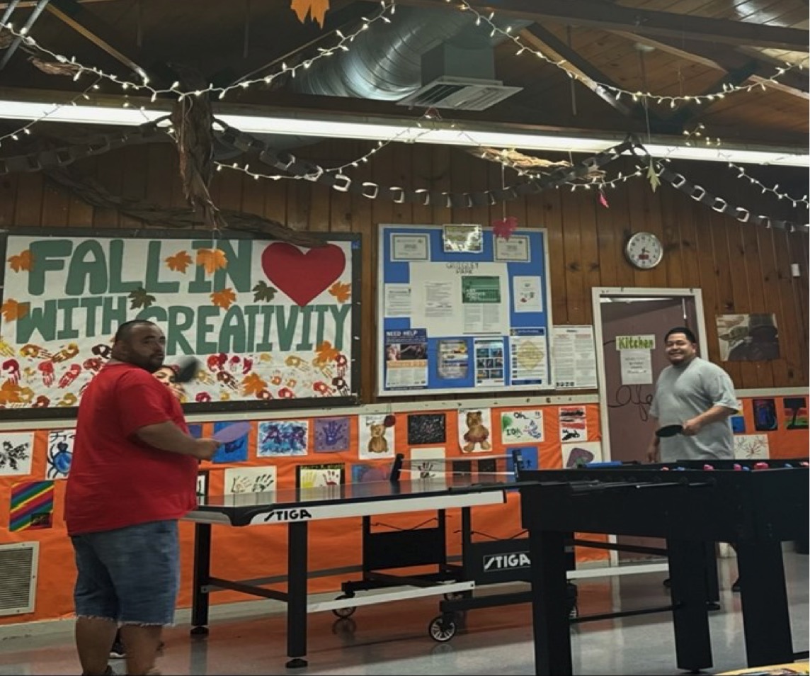 Armando E. and Alejandro P. playing ping pong.