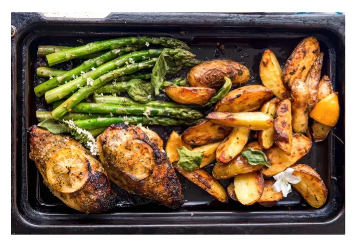 Lemon herb chicken with asparagus and potatoes.