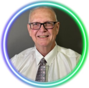 Portrait of Bud Mullanix, CVTC Chief Executive Officer, smiling in a white shirt and tie.